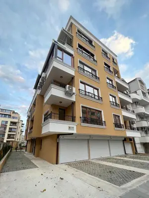 a tall apartment building with a lot of windows at SOS CoMFORT 2 LAZUR in Burgas City