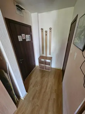 an empty room with two baseball bats on the wall at VV Vigo Apartments in Nesebar