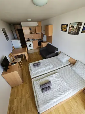 a living room with two beds and a couch at VV Vigo Apartments in Nesebar