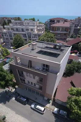 an aerial view of a building in a city at Ivatea Family Hotel in Ravda