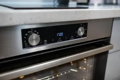 a close up of an oven with a counter at Brand New Downtown Apartment in Varna City