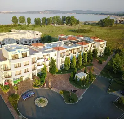 an aerial view of a large building with a parking lot at Hotel Paradise Garden in Chernomorets