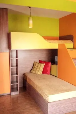 a bedroom with two bunk beds in a room at Aпартамент в близост до морето и центъра in Burgas City