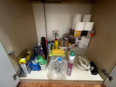 a shelf in a room with a bunch of items at Elit 4 Apartments in Sunny Beach