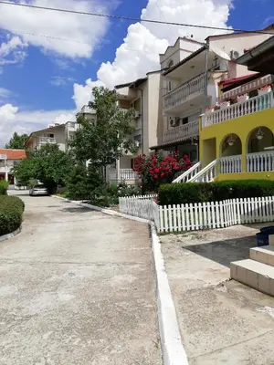 a parking lot in front of a building at Apartments Bravo 1-Vichevi in Sunny Beach