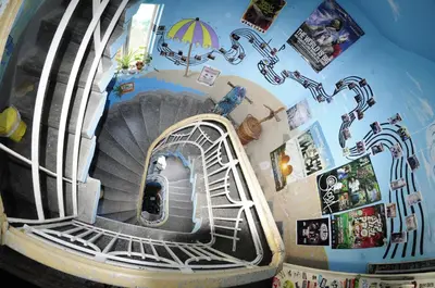 a drawing of a spiral staircase in a room at Yo Ho Hostel in Varna City