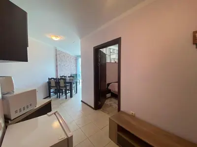 a room with a kitchen and a dining room at SUNNY BEACH PLAZA 4-34 Apartment in Sunny Beach