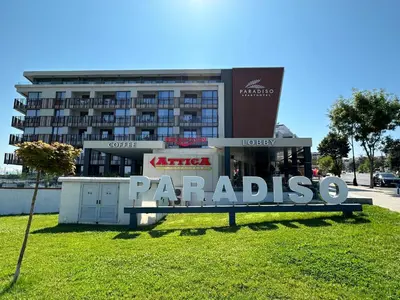 a large sign in front of a building at Sea View Private Studio Paradiso B 508 in Nesebar