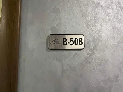 a license plate on the wall of a door at Sea View Private Studio Paradiso B 508 in Nesebar