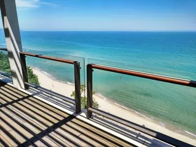 a view of a beach from a balcony at Private Apartments in Yoo Bulgaria Complex in Obzor