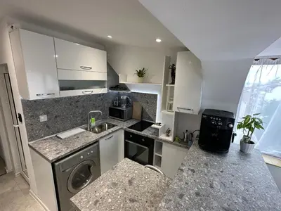 a small kitchen with a sink and a dishwasher at Lovely studio in Burgas in Burgas City