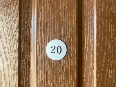 a wooden door with the number on it at PANORAMA BAY 20 Fancy Studio in Sveti Vlas