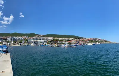 a group of boats are docked in a harbor at ROYAL BAY 6 Sea View Apartment in Sveti Vlas