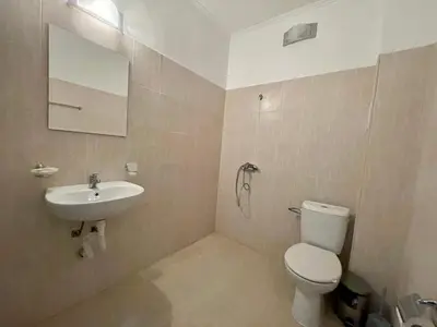 a bathroom with a toilet and a sink at Sveti Vlas - Central Beach Studio by Flat Mаnаger in Sveti Vlas