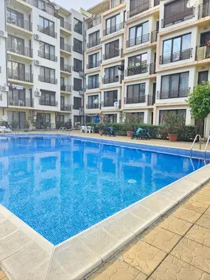 a large swimming pool in front of a building at SannyBeach AmberBeach Apartment Bulgaria A14-1 in Sunny Beach