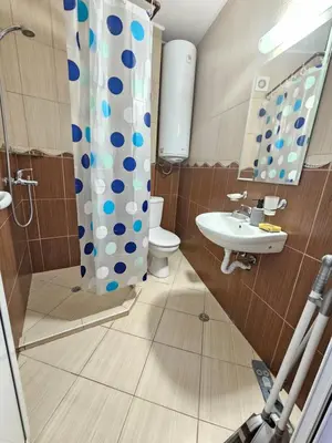 a bathroom with a toilet and a shower and a sink at SannyBeach AmberBeach Apartment Bulgaria A14-1 in Sunny Beach