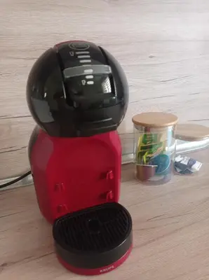 a red blender sitting on top of a table at Apartament Lili Sozopol in Sozopol