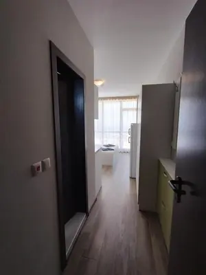 an empty room with a hallway with a mirror and a door at Studio Sorrento Sole Mare-Bastet BS in Sveti Vlas