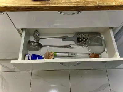 a drawer filled with kitchen utensils on a counter at AVRORA in Varna City