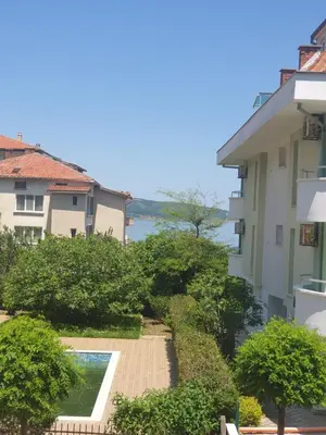 a view from the balcony of a building at Стаи за гости Мистрал in Primorsko