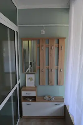 a room with a dressing table and a mirror at City Center Apartment in Burgas City