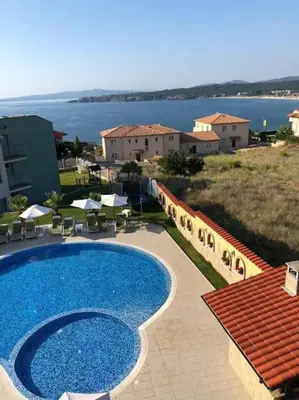 a large swimming pool on top of a building at Gorgeous, 1 Bed Apt, Sea Views. in Duni