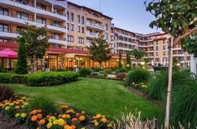 a park in front of a large building at Royal Sun Complex in Sunny Beach