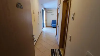 a hallway with a hallway leading to a room at Royal Sun Complex in Sunny Beach
