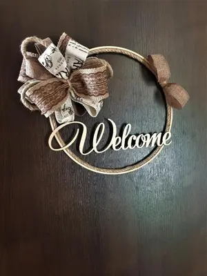 a bow on a table with the word welcome at Elisa Studio in Byala