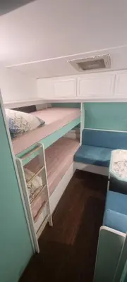 a room with two bunk beds in a room at Каравана Тиана in Sozopol