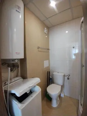 a small bathroom with a toilet and a sink at Apartament Sea Fort Club Grand Resort Fort Noks Sveti Vlas-Bastet BS in Elenite