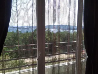 a window with a view of the ocean at Апартаменты за гости Гаван in Byala