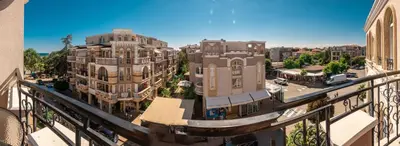 an aerial view of a city with buildings at Melia lux apartment in Ravda