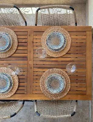 a wooden table with baskets on top of it at Apartment Royal Bay Sveti Vlas in Sveti Vlas