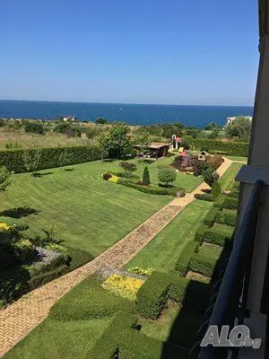 an aerial view of a garden with the ocean at Apartments Atia Resort in Chernomorets