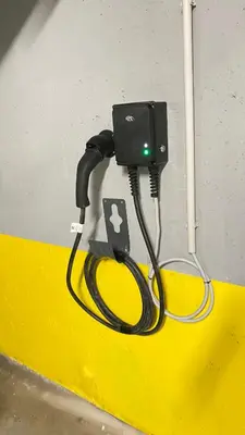 a charger for an apple charging station on a wall at Arena MALL Galleria View and Securities Parking1 in Burgas City