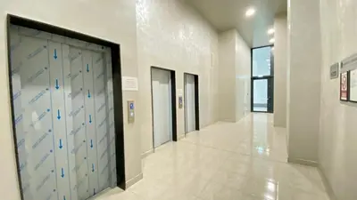 a hallway with four lockers in a building at Arena MALL Galleria View and Securities Parking1 in Burgas City