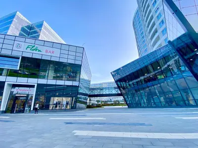 a group of tall buildings in a city at Arena MALL Galleria View and Securities Parking1 in Burgas City