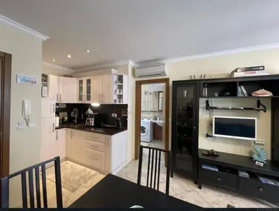 a kitchen with a counter top and a microwave at Sea Bliss Retreat -Santa Marina - Sozopol in Sozopol