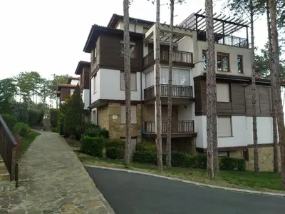 a large building with trees in front of it at Sea Bliss Retreat -Santa Marina - Sozopol in Sozopol