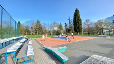 a group of people playing on a basketball court at Arena MALL Galleria View and Securities Parking2 in Burgas City