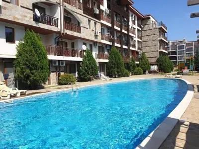 a large swimming pool in front of a building at MitProt Panorama Bay 2 Luks studio 155 in Sveti Vlas