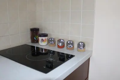 a kitchen counter with a stove top oven at 1 bedroom apartment in Santa Marina Sozopol in Sozopol