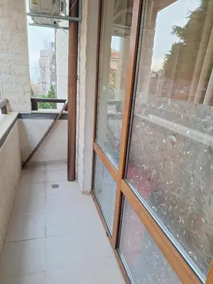 a window in a building with a broken glass at LaRaMi Studio in Sveti Vlas