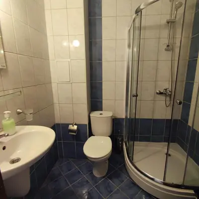 a bathroom with a toilet and a sink and a shower at Sunset Beach 3 - Apartments in Sunny Beach