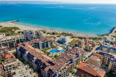 an aerial view of a city and the ocean at Rose Gardens Apart Hotel in Pomorie
