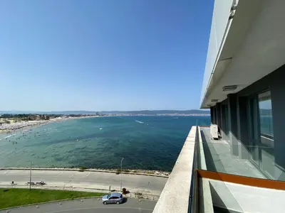 a view of the ocean from the balcony of a building at PARADISO 'В' 609 Studio Nessebar Private in Nesebar