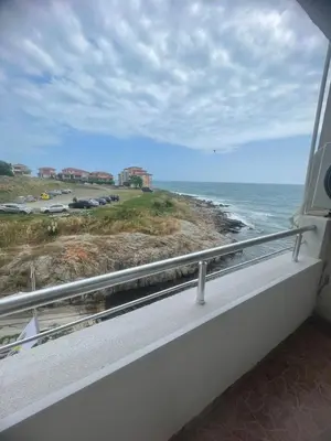 a balcony with a view of the ocean at Свети Никола in Sozopol