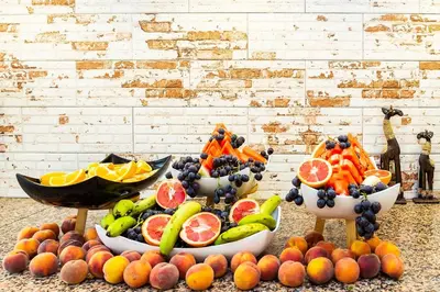 a bunch of fruits and vegetables in bowls on a table at Complex Sunrise by HMG - All Inclusive in Sunny Beach
