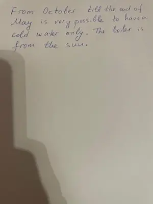a handwritten note on a white wall with handwriting at Sun Houses Novo Oriahovo in Novo Oryakhovo